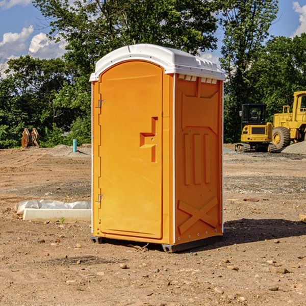 how often are the porta potties cleaned and serviced during a rental period in Dumas